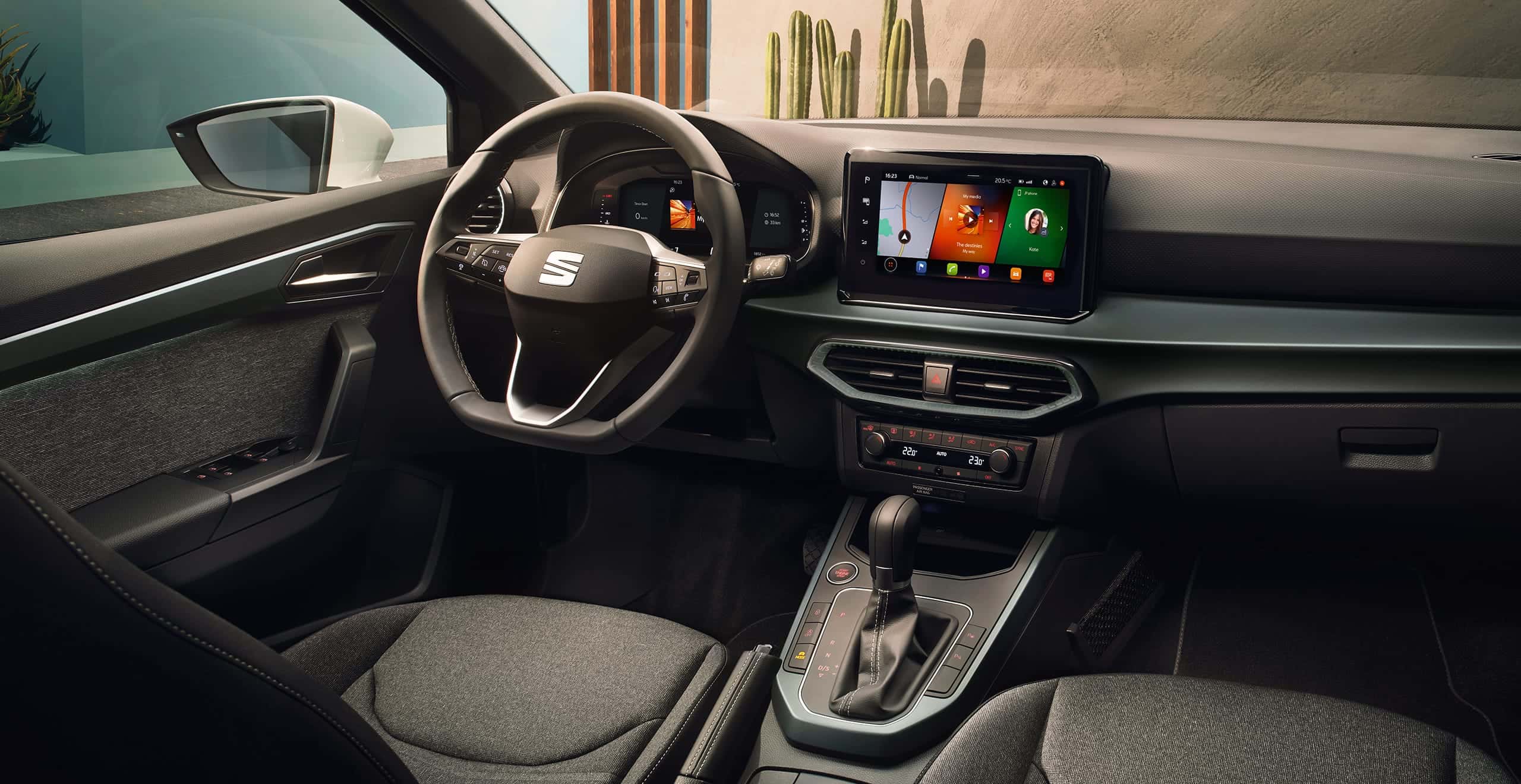SEAT Arona interior view of the floating 9.2″ touchscreen and multifunctional steering wheel