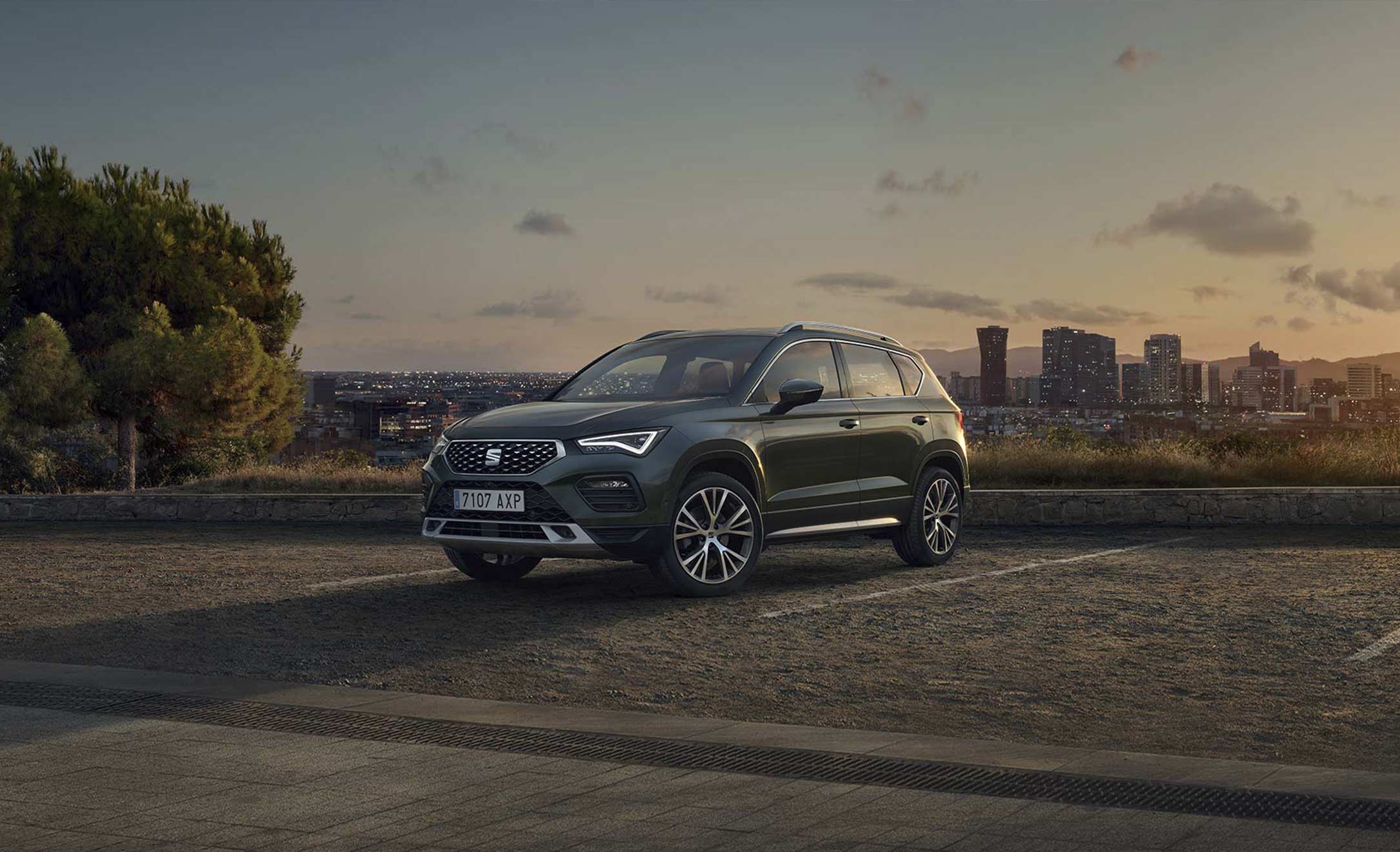 SEAT Ateca dark camouflage colour in a parking lot. 
